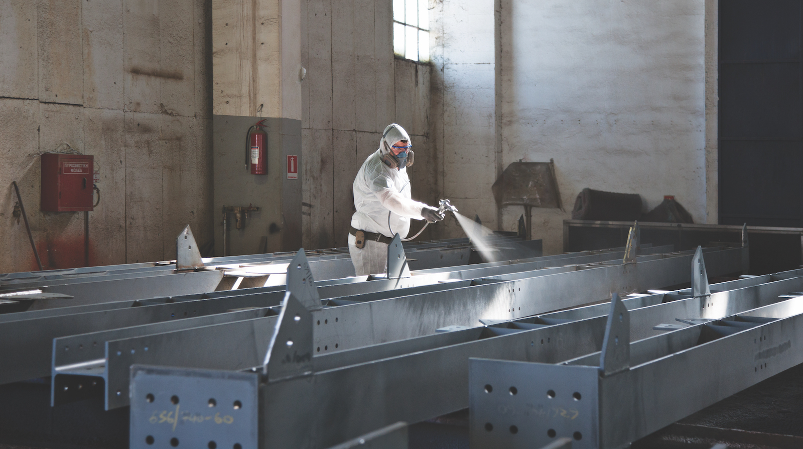 Factory application of intumescent paint. Photo credit: Hempel