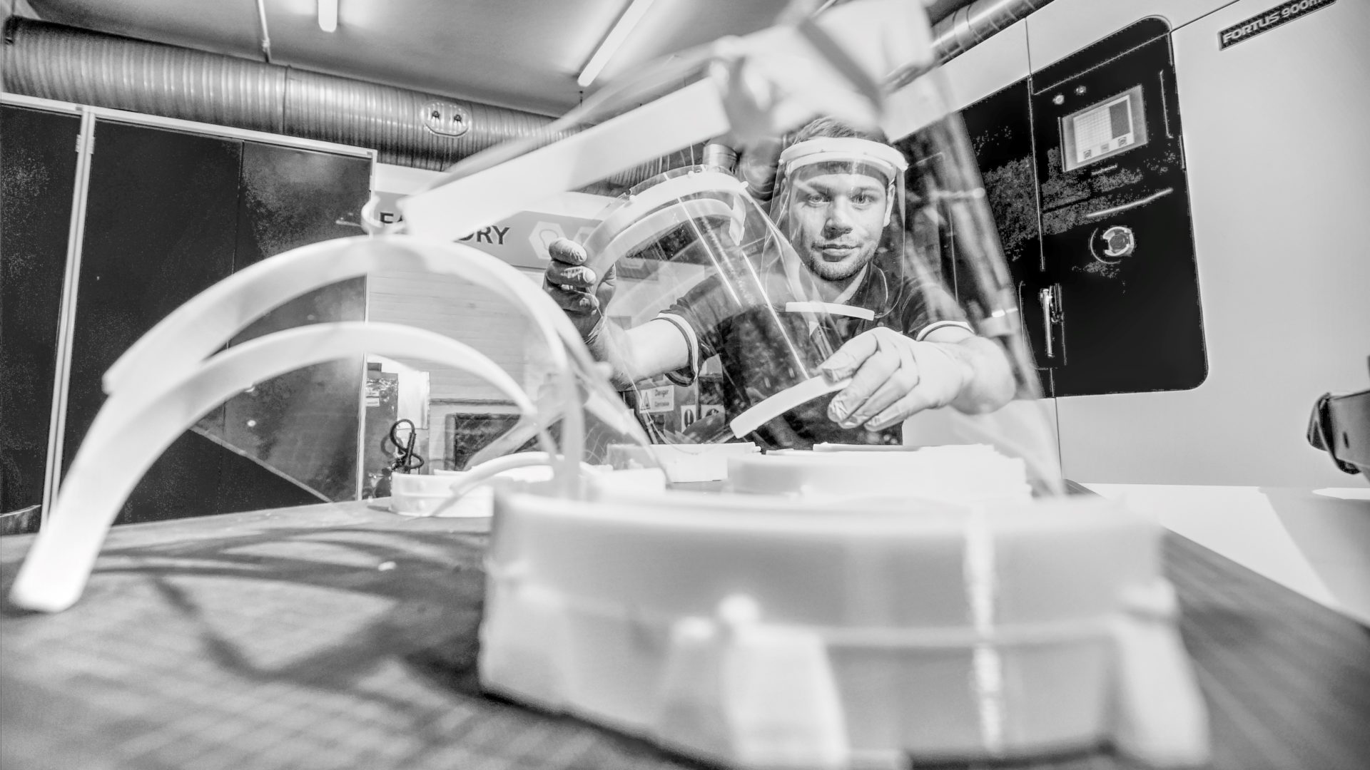 With PPE for frontline workers in short supply, construction workers pitched in to manufacture visors, including JCB employee Joe Mumby