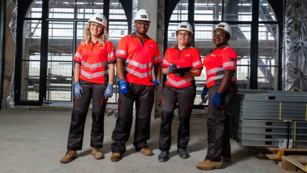 Laing O'Rourke workers showcase the new workwear, created with Jermyn Street Design at Tte Whiteley Building, London (Image: Bronac McNeill)