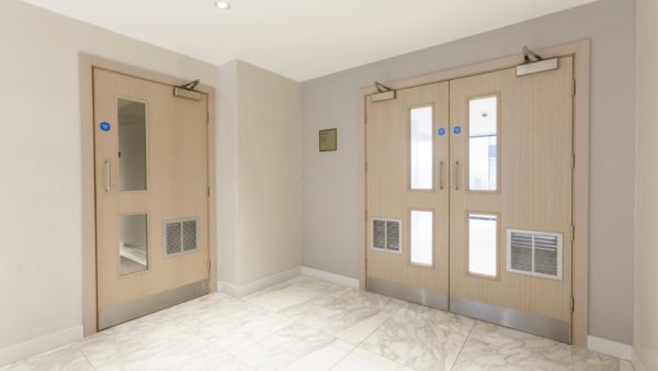 A landing with two fire doors.