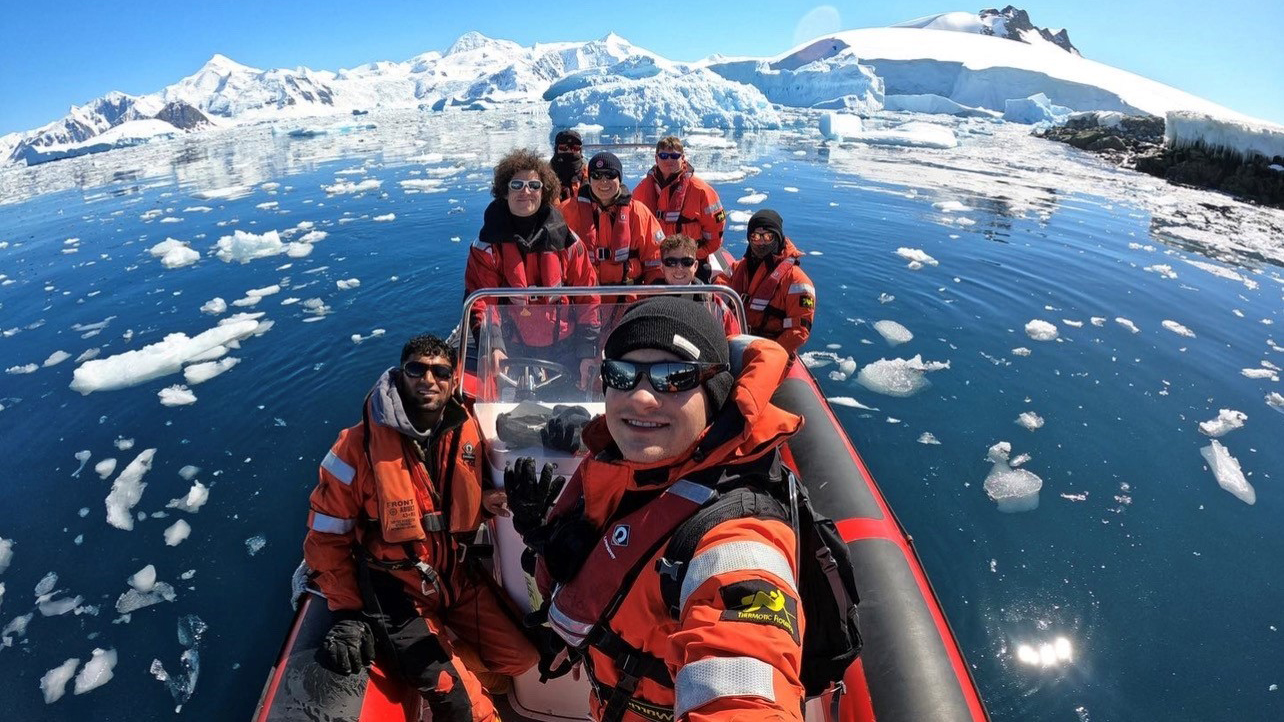 British Antarctic Survey - BAM engineer Stuart Webster with colleagues on a boat trip in Antarctica during a rare calm day (Stuart Webster)