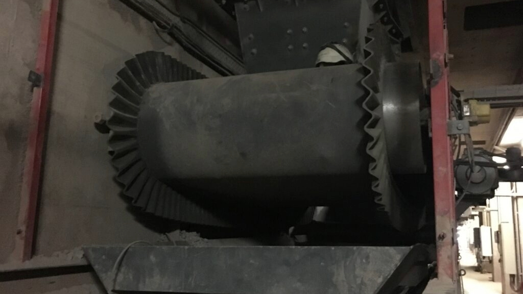 Tarmac fined - A feed hopper and conveyor