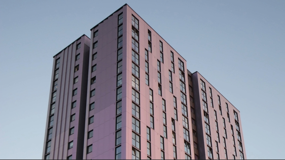 Detail of the top of a high-rise block of flats.