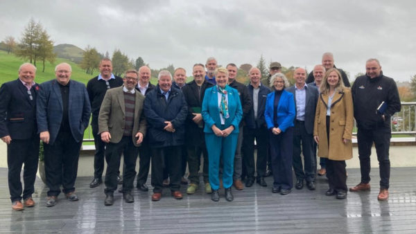 A group of people smiling at the camera.
