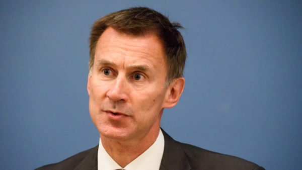 Headshot of a man weating a tie.