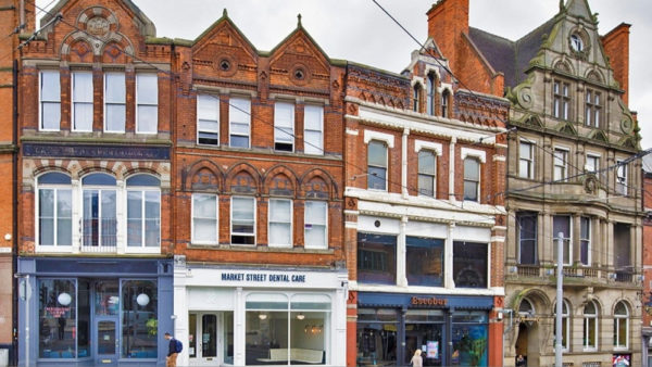 Row of front houses in red brick.