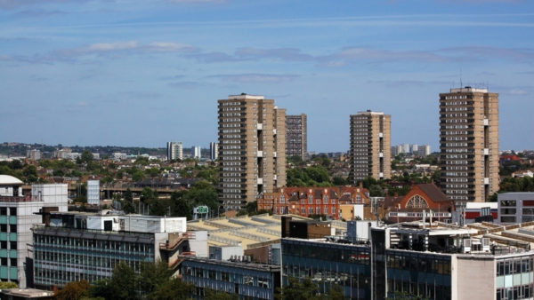 Skyline with high-rises and lower houses.