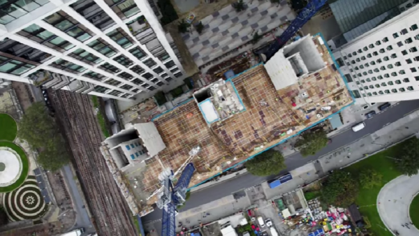 Aerial view of a tower under construction.