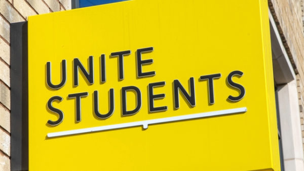 A square yellow sign with the words 