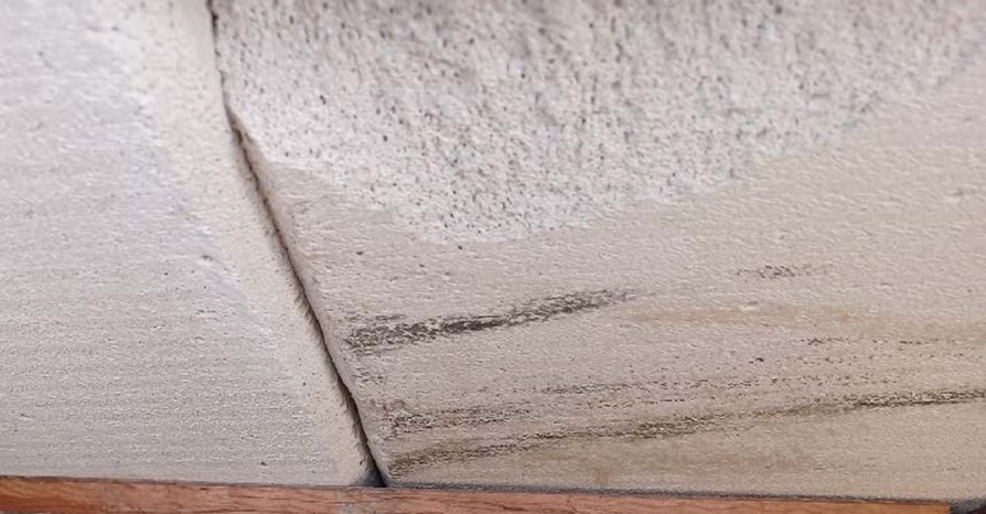 RAAC panels typified by aerated texture and chamfered edges forming grooves between panels © Purcell
RAAC listed buildings