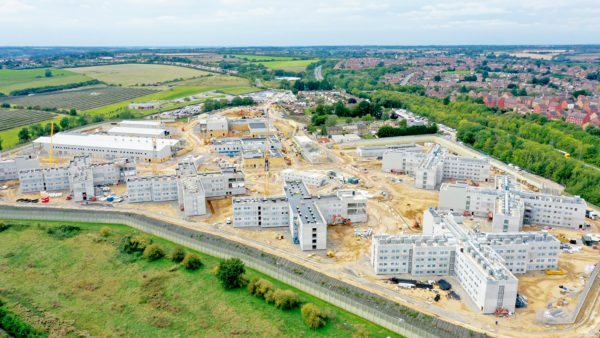 Aerial view of the X-shaped houseblocks that make HMP Five Wells prison. Kier is building a similar prison expansion at HMP Channings Wood.