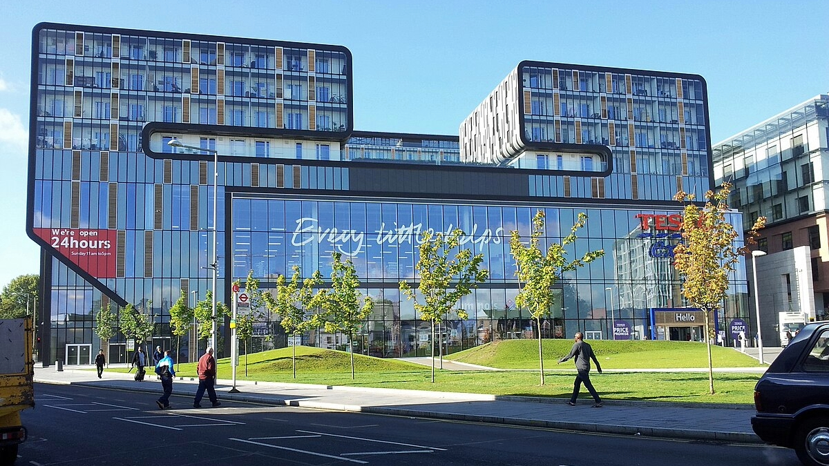 A big housing development with a Tesco supermarket at the bottom.