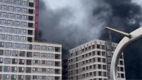 Thick smoke clouds engulf a Bouygues construction site in East London