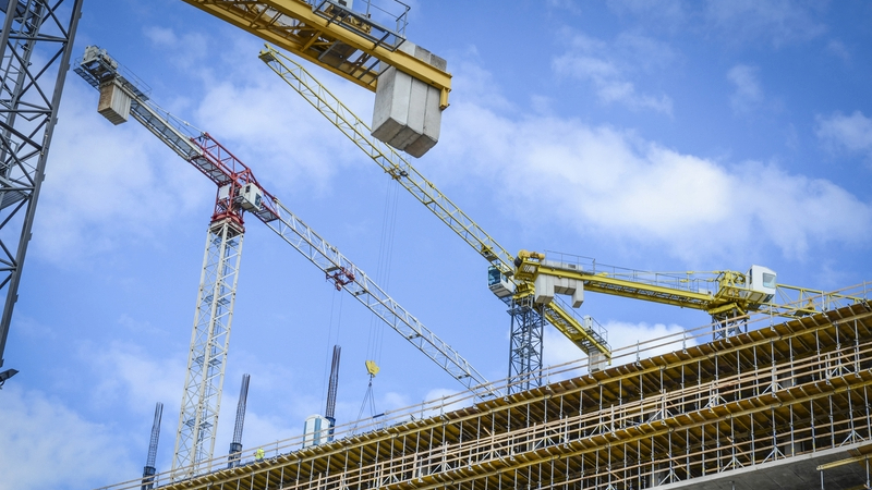 General view of large scale construction site with many cranes. Glenigan has forecast a boost in the industry.