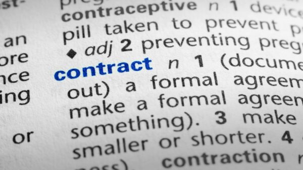 The word Contract in a dictionary, word in blue with rest of page text in black - this article deals with why mandatory reporting on retentions puts construction contracts in the spotlight