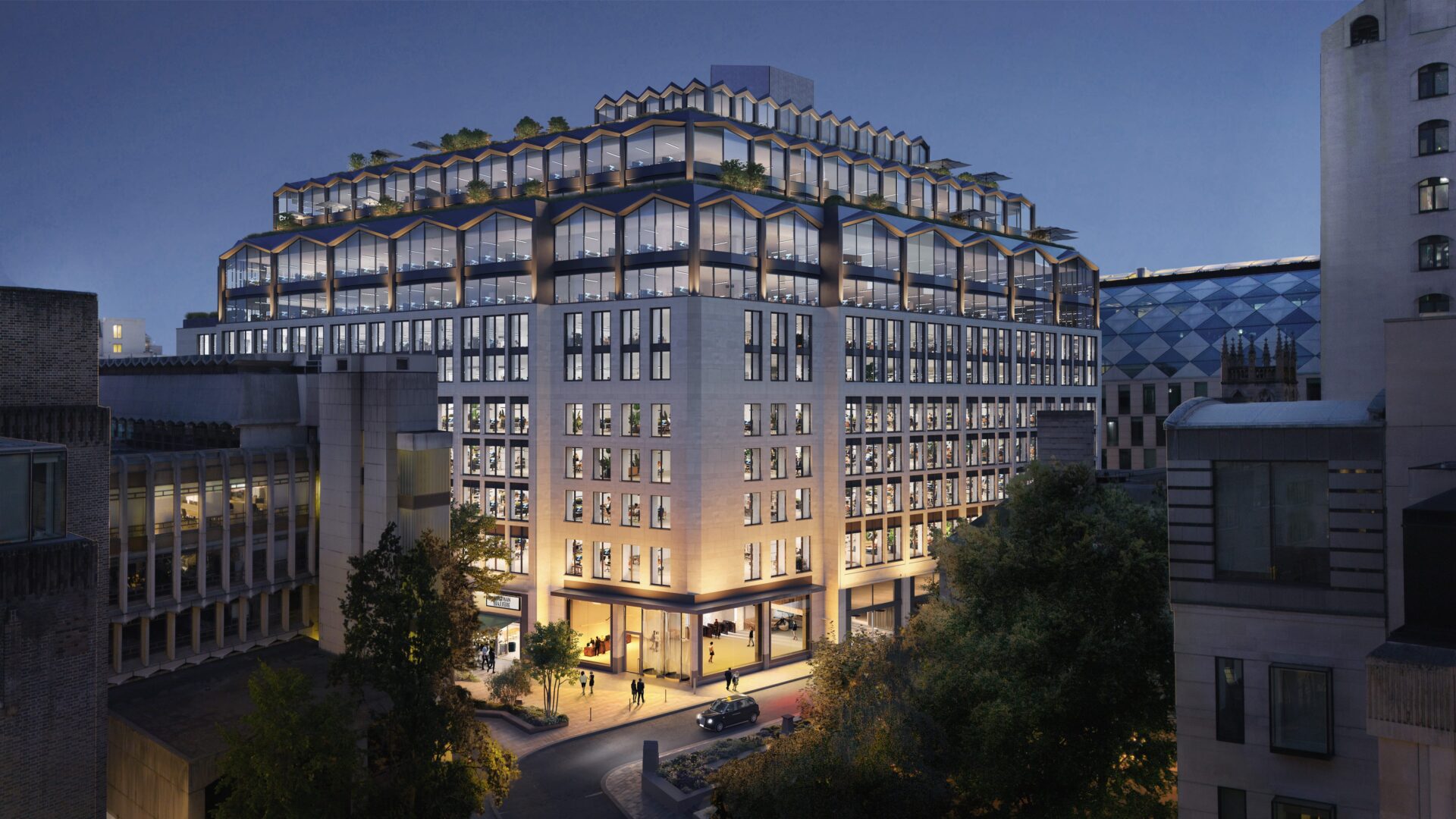 Mace fossil fuel-free - A computer-generated image of a new big office building at night - Mace appointed to deliver one of London’s largest retrofit projects