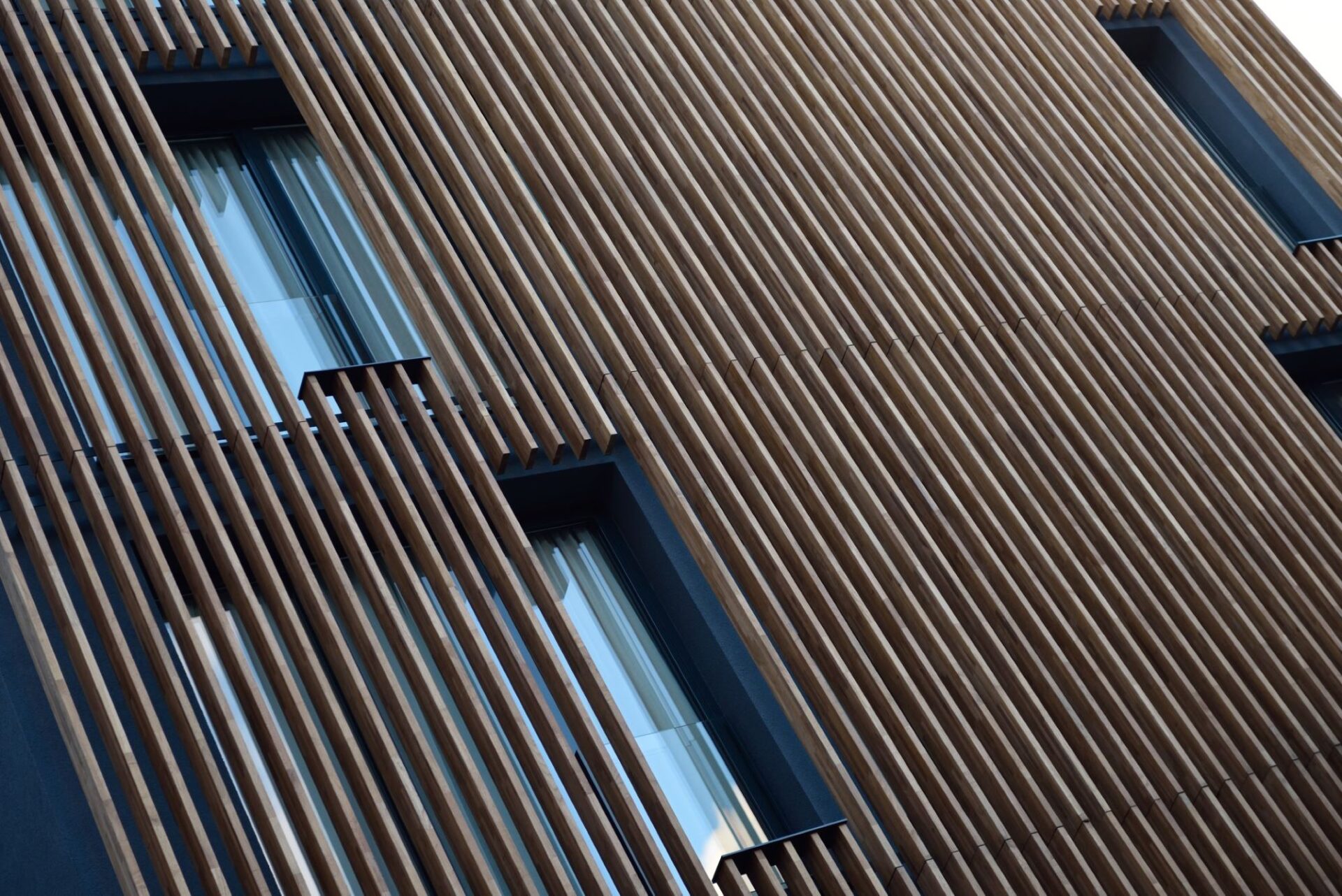 Designing out humming due to cavity resonance in front of windows is called for when façades feature vertical solar shading (image: Dreamstime).