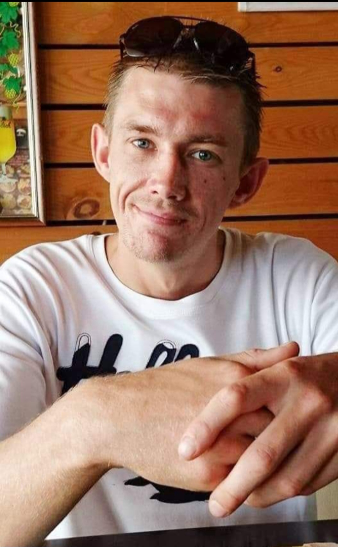 A young man smiling at the camera - Piper Homes has been fined £300,000 after a young worker was crushed to death by concrete blocks.