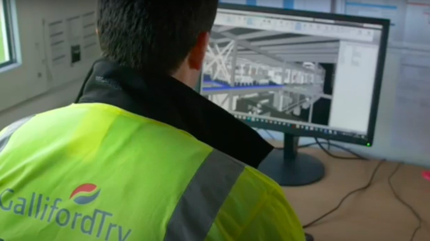 Image of Galliford Try staff working on digital files - for story about Galliford Try DfE training resources