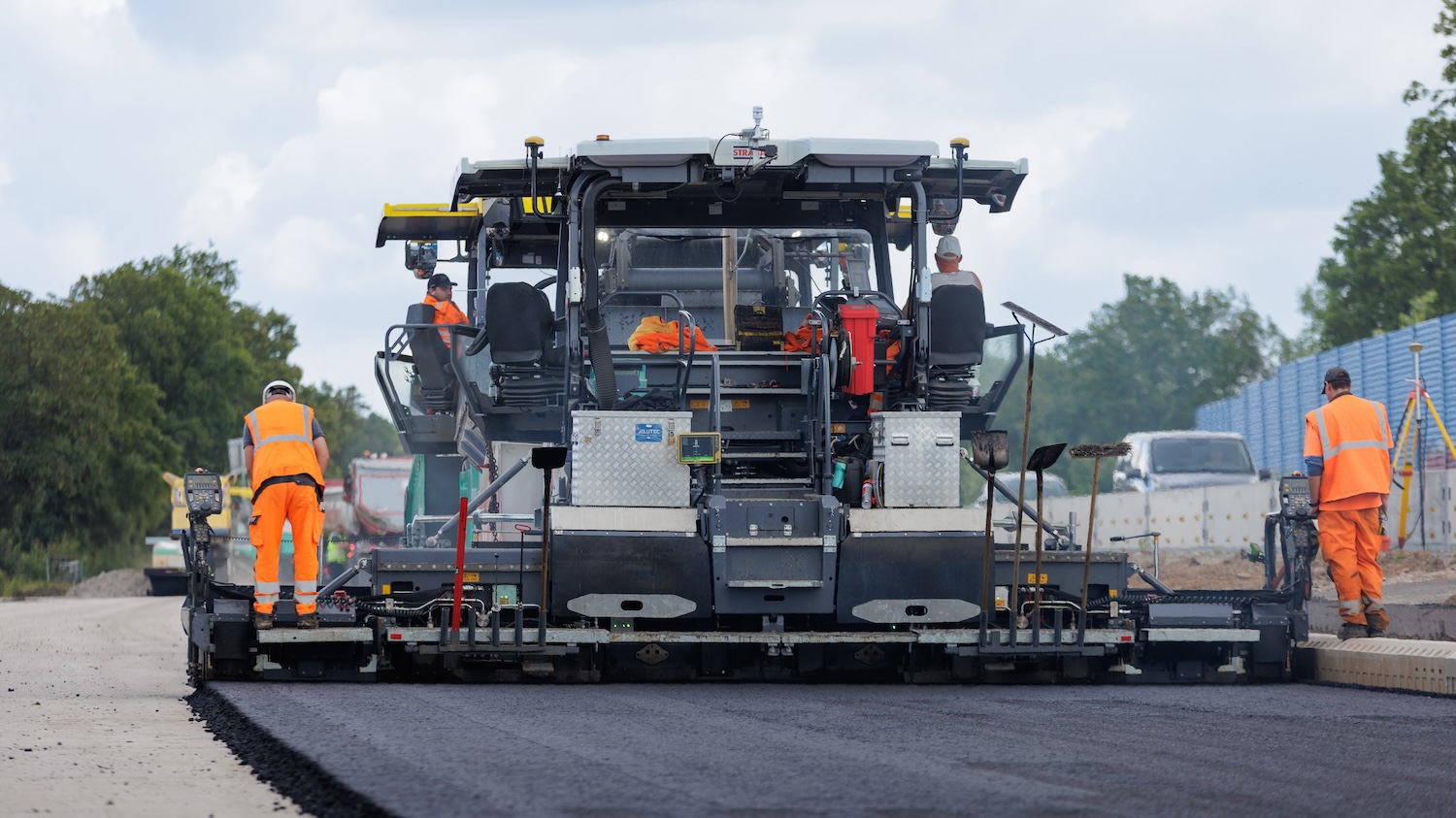 Image of an integrated paver at work for Topcon road construction tech story