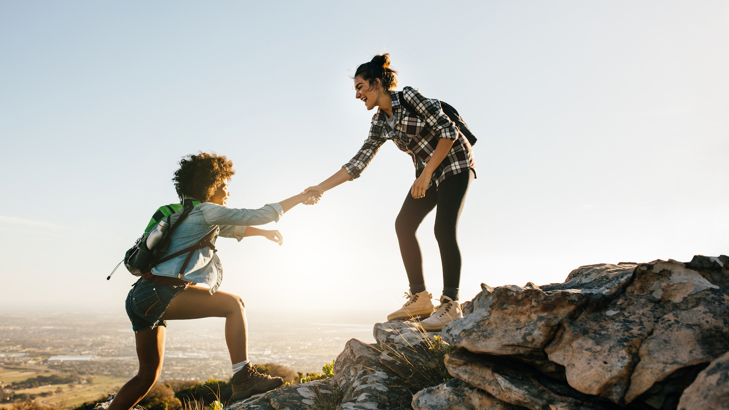 Image of two women climbing to illustrate mentoring 
Women in BIM mentor scheme