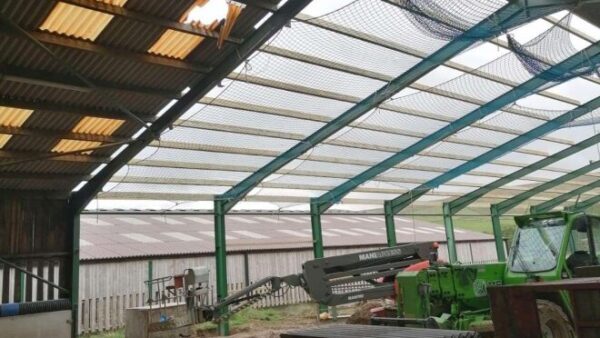 A roof under construction in a barn - a 30-year-old worker fell through it and suffered life-changing injuries