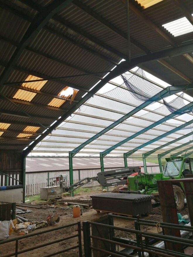 roof fall - A roof under construction in a barn - a 30-year-old worker fell through it and suffered life-changing injuries