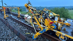 A yellow track trolley on a track that's collided against some equipment - RAIB has released its report into the runaway of a trolley and subsequent collision at North Rode, Cheshire