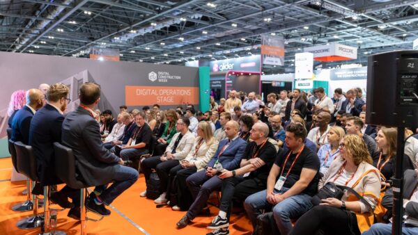 Audience watching a debate at Digital Construction Week 2025