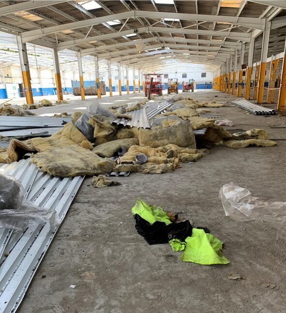 Demolition firm prosecuted The warehouse where the accident happened - The roof of the warehouse with gaps - Demolition firm fined after worker seriously injured in fall from height