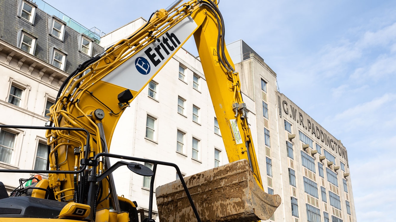 Image of Erith-branded crane on site for Erith Group PlanRadar story