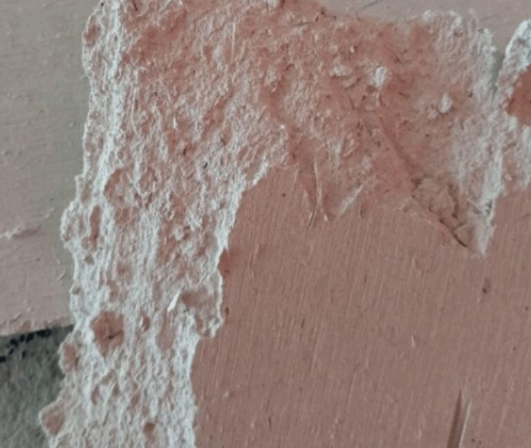 asbestos school - Close up image of the asbestos containing material - Site supervisor fined after exposing school pupils to asbestos