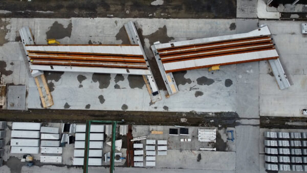 Aerial drone shot of two thirds of Greek Street railway bridge during assembly trials in Ireland