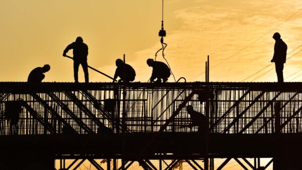 Construction workers in silhouette (Wall Hwang, Dreamstime)