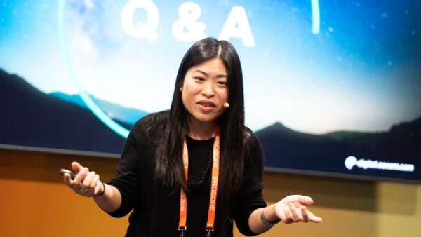 Lilian Ho presenting on stage at Digital Construction North 2024 DCN