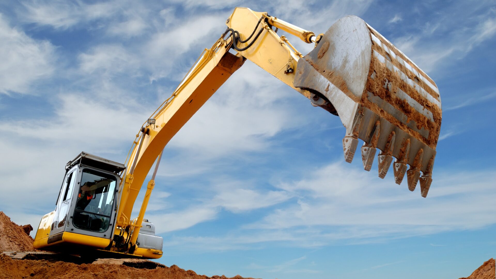 Excavator loader in sandpit - Caterpillar and a Chinese excavator manufacturer has asked the TRA reconsiders its anti-dumping tariffs