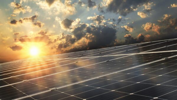 Solar panel with sunset background - Mace, Aecom and Barker have been appointed to decarbonise the UK's schools