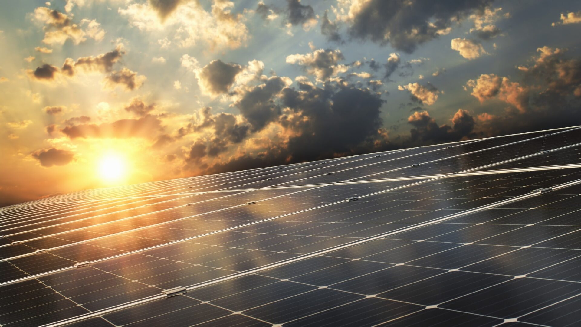Solar panel with sunset background - the Department for Education has appointed Mace, Aecom and Barker for a major schools decarbonisation programme.
