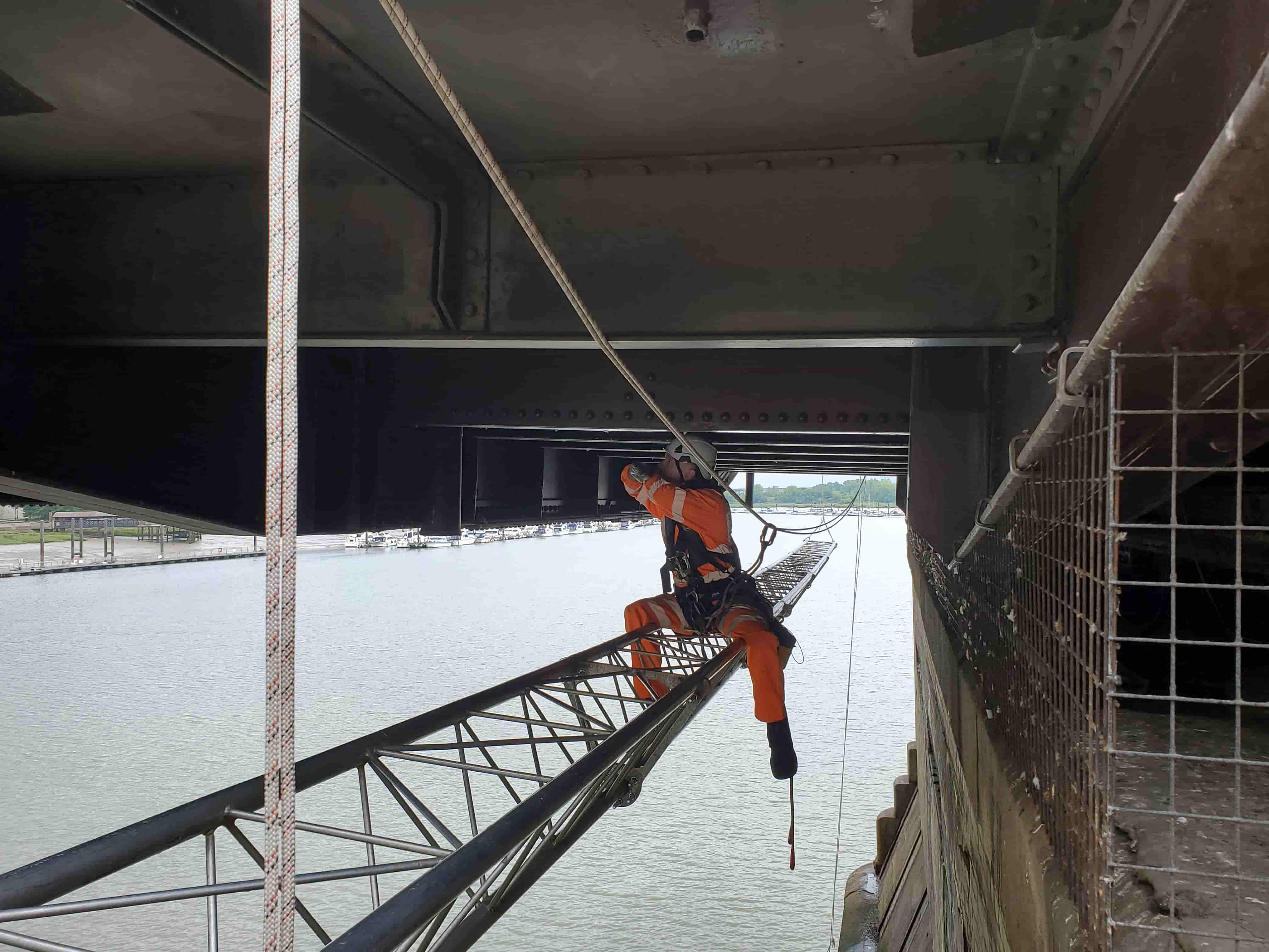 Skilled rope access inspectors carry out a detailed inspection that puts them within touching distance of all elements of the bridge.