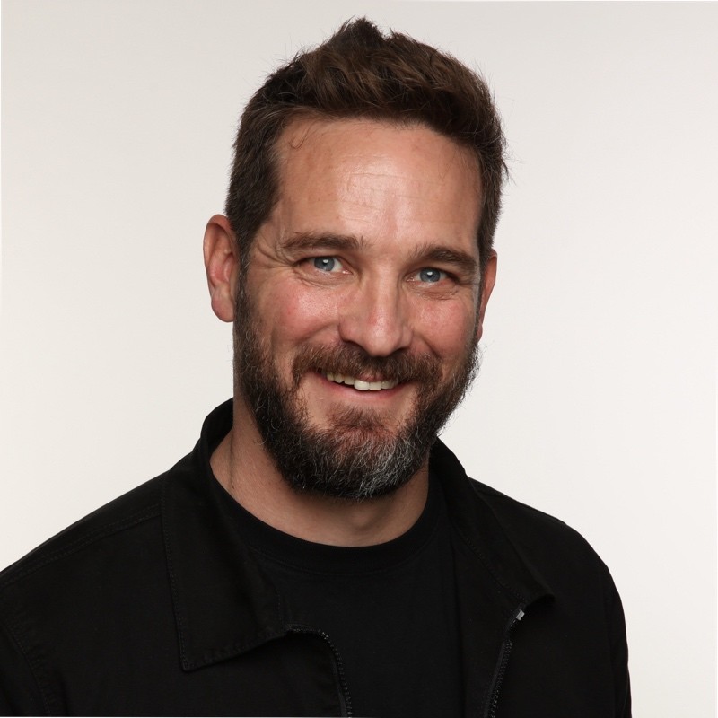 Mugshot of a man smiling at the camera - Brett King, Director of Industry Transformation