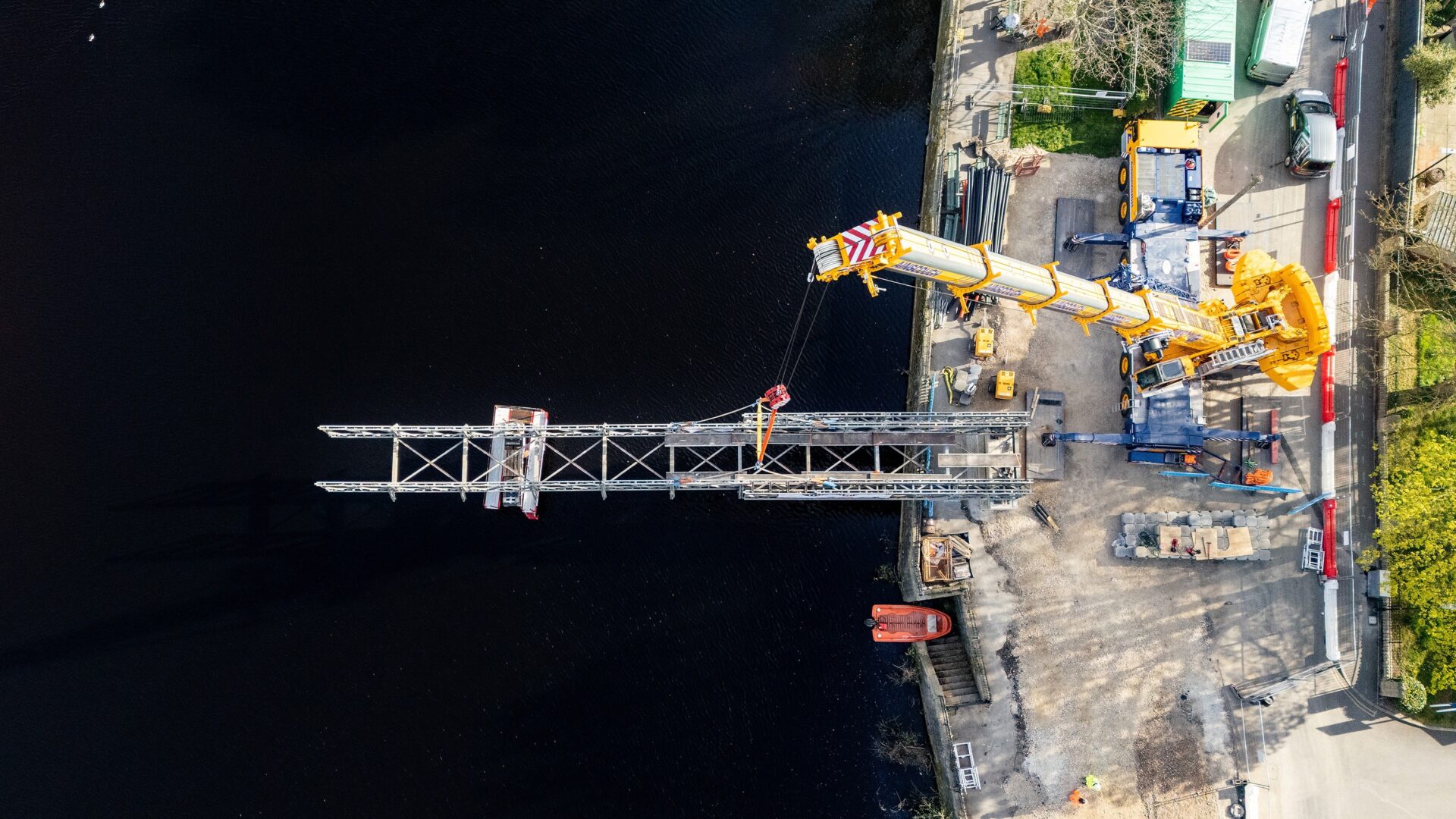 Balfour Beatty Otley Bridge - A temporary bridge structure being lifted by a crane - Mabey Hire designed a temporary bridge for Balfour Beatty during refurb works of Otley Bridge.
