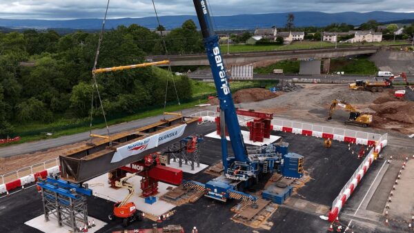 A huge steel beam in position on its tressels - it's one of the beams that Skanska will install in the new railway bridge above the M6 in Penrith