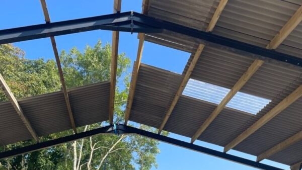 Roof of a partially constructed barn - a firm has been fined after a worker fell from it and suffered injuries