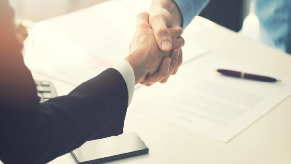 Close up of a handshake